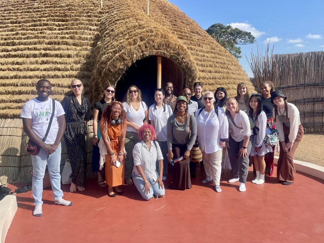 Group of study abroad students and faculty member, Hollie Nyseth Nzitatira, in Rwanda