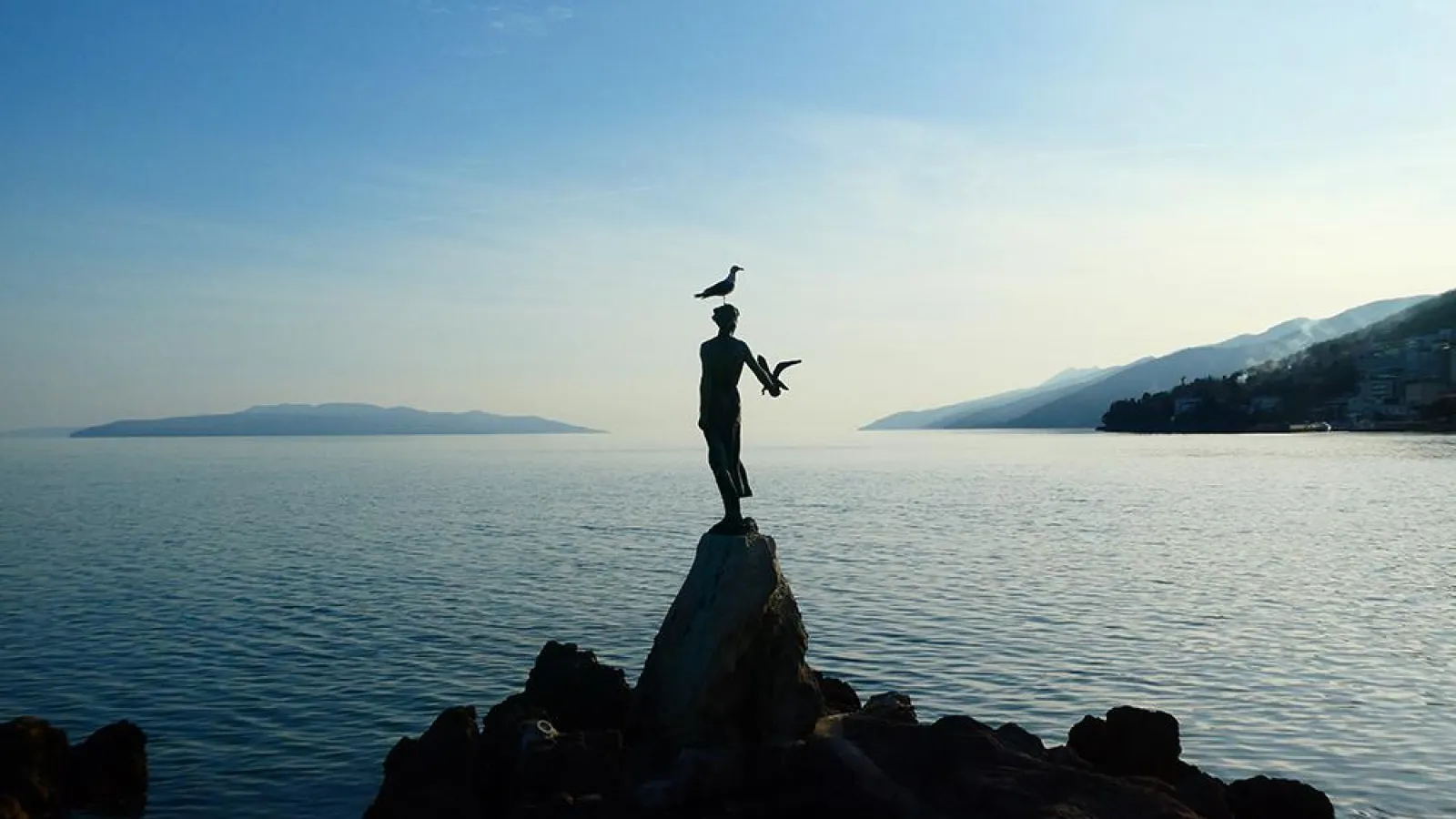 A Seagull Lands on the Maiden with the Seagull in Opatija, Croatia taken by Mike Vuolo
