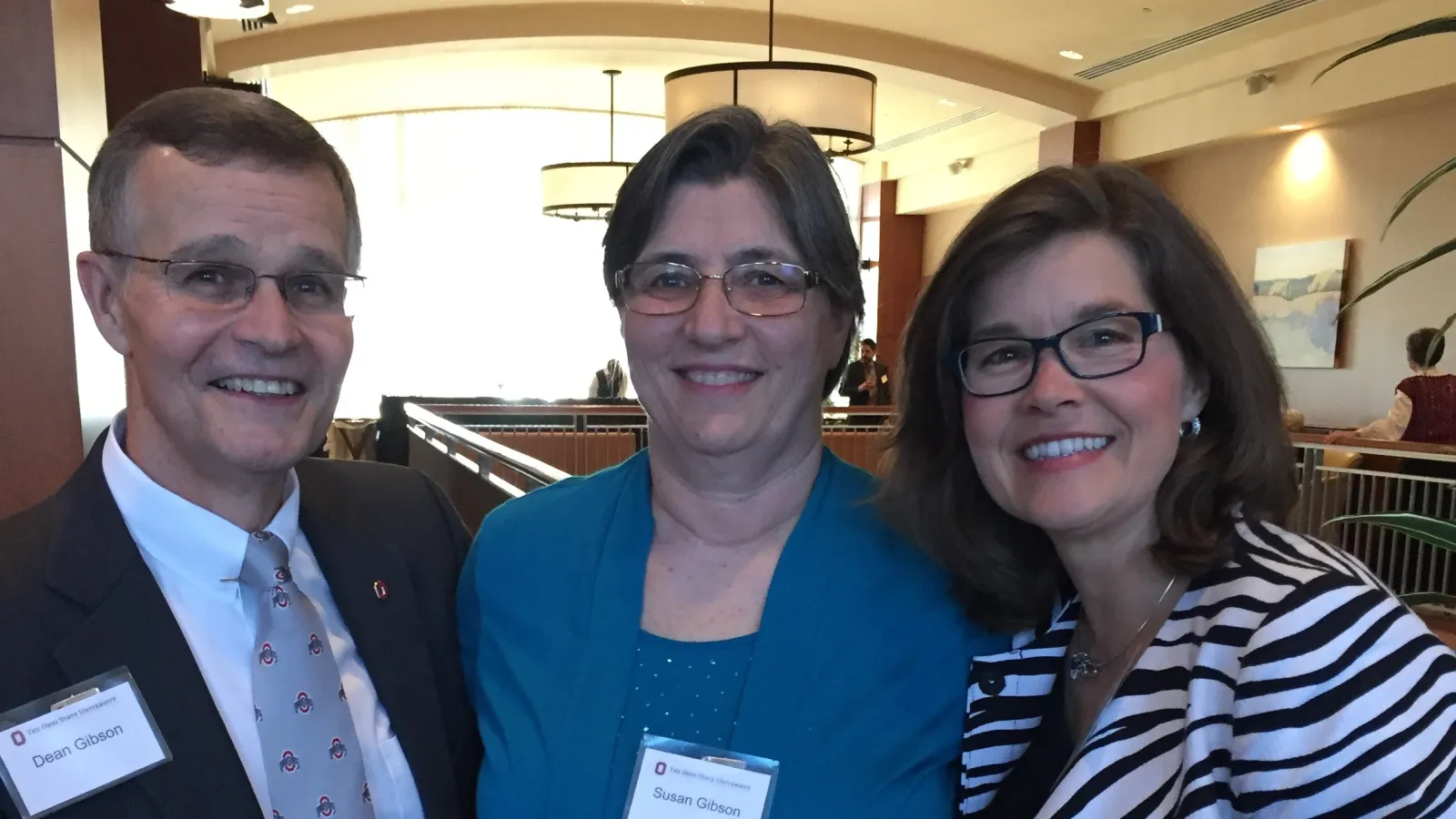 Photo of Dean and Susan Gibson with Claudia Buchmann