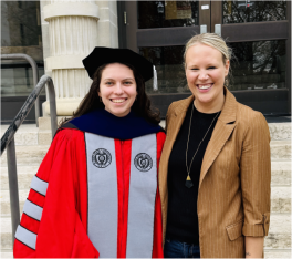 Rebecca Shankman in her doctoral robes with advisor, Hollie Nyseth Nzitatira