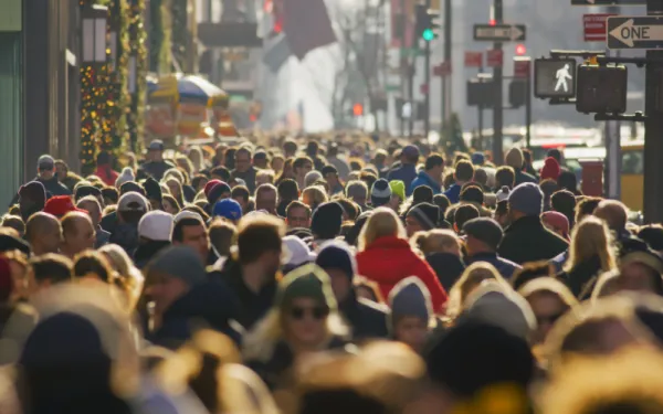 A crowded street full of people in New York City