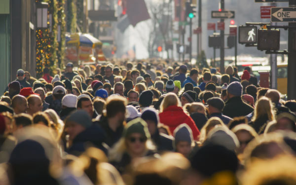 A crowded street full of people in New York City