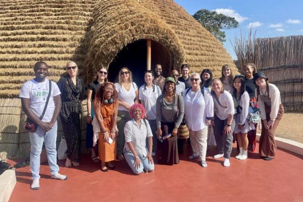 Group of study abroad students and faculty member, Hollie Nyseth Nzitatira, in Rwanda